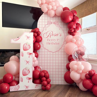 Berry Birthday Backdrop | Personalised pink gingham backdrop with strawberry red balloon garland