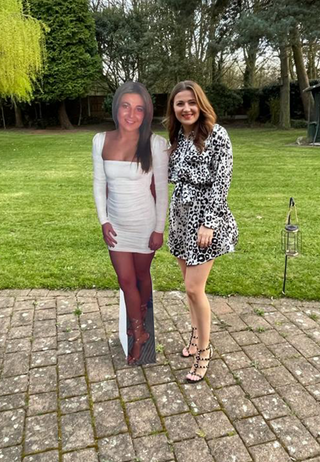 Custom Photo Cut Out | Personalised life-size cardboard standee shown outdoors beside the person from the original photo