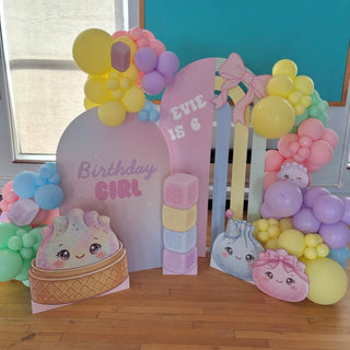 Kawaii Birthday Backdrop | Pastel balloon display with rainbow arch, bow, cute character cut-outs and birthday props