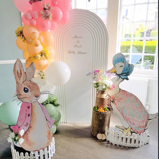 Peter Rabbit Baby Shower Backdrop | Neutral arch with pastel balloons, floral details and character cut-outs