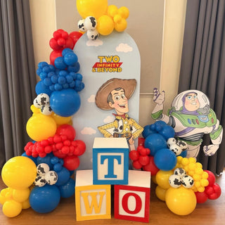 Toy Story Birthday Backdrop | Colourful balloon display with Woody, Buzz Lightyear and alphabet block props