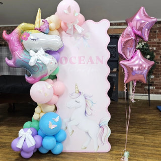 Unicorn Birthday Backdrop | Personalised pink display with pastel balloon garland, unicorn design and star balloons